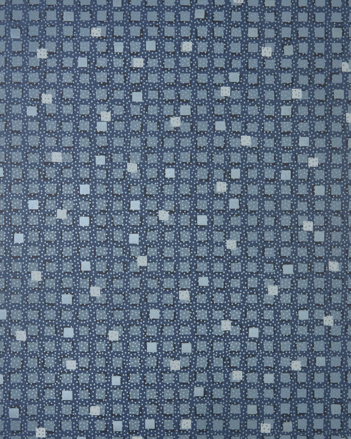 A close-up of a blue patterned wallpaper with a repeating geometric design of small white and light blue squares on a dark navy background.